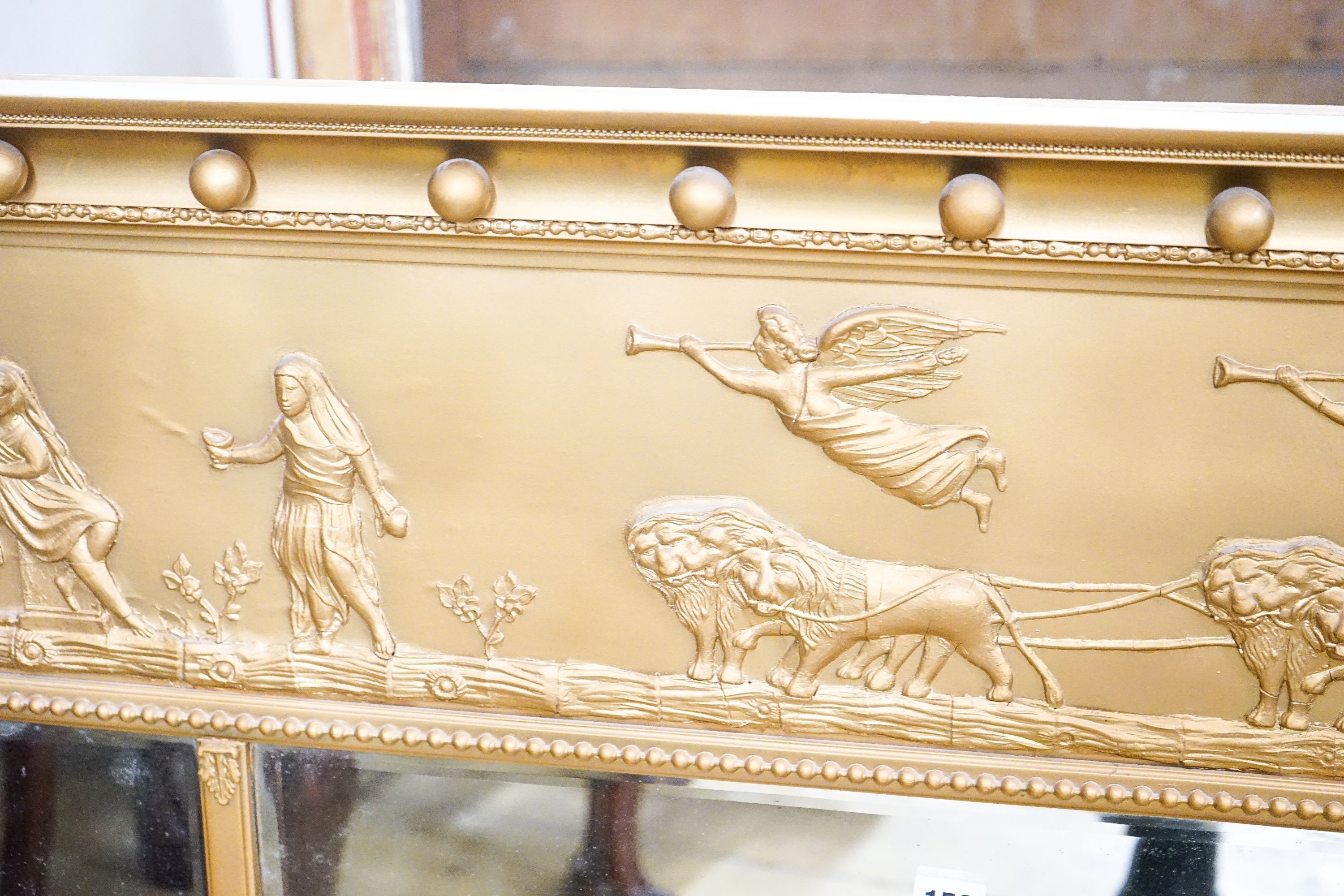 A Regency style giltwood and gesso overmantel mirror, length 140cm, height 88cm